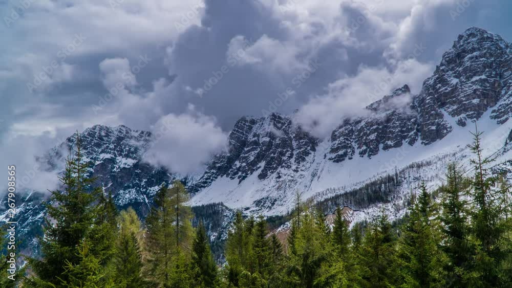 Time Lapse of Dolomites mountain with great rain cloud or storm in the sky, Italy . Nature fog landscape and travel destination of Northern Italy in time lapse. Zoom out. 4K Time Lapse of Dolomites mountain with great rain cloud or storm in the sky, Italy . Nature fog landscape and travel destination of Northern Italy in time lapse. Zoom out. 4K