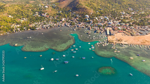 Sign of the city of Coron on the hill. Palawan Busuanga.Cross on hill, sign of the city of Coron tourist place. Aerial view Catholic cross on mountain Philippines,Palawan Busuanga .Travel concept.