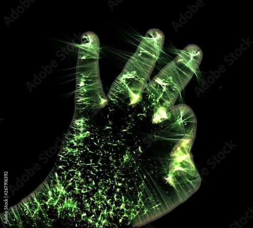 Glowing kirlian aura photography with green corona of a male human hand photo