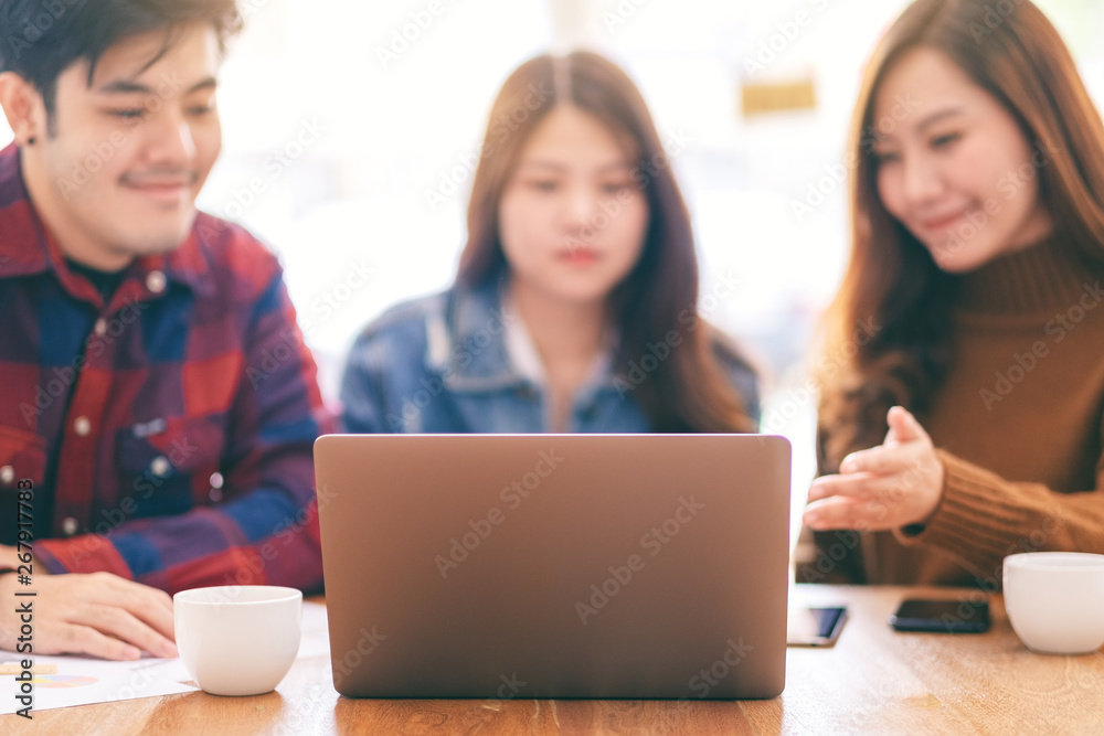 Three asian businessman working and discussing business together in a meeting Three asian businessman working and discussing business together in a meeting