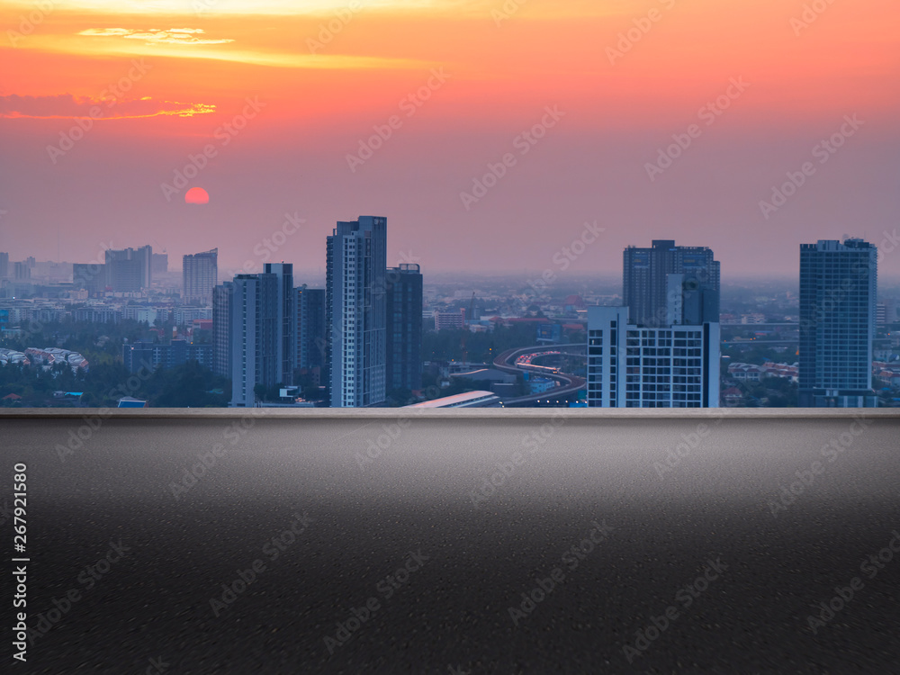 Rooftop overlooking the city in the evening Rooftop overlooking the city in the evening