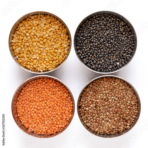 Chickpea, Red Lentil, Split Chickpea, Black gram, Black lentil, Garbanzo Beans, Horse Gram, Gahat Dal in steel bowel isolated on white background.