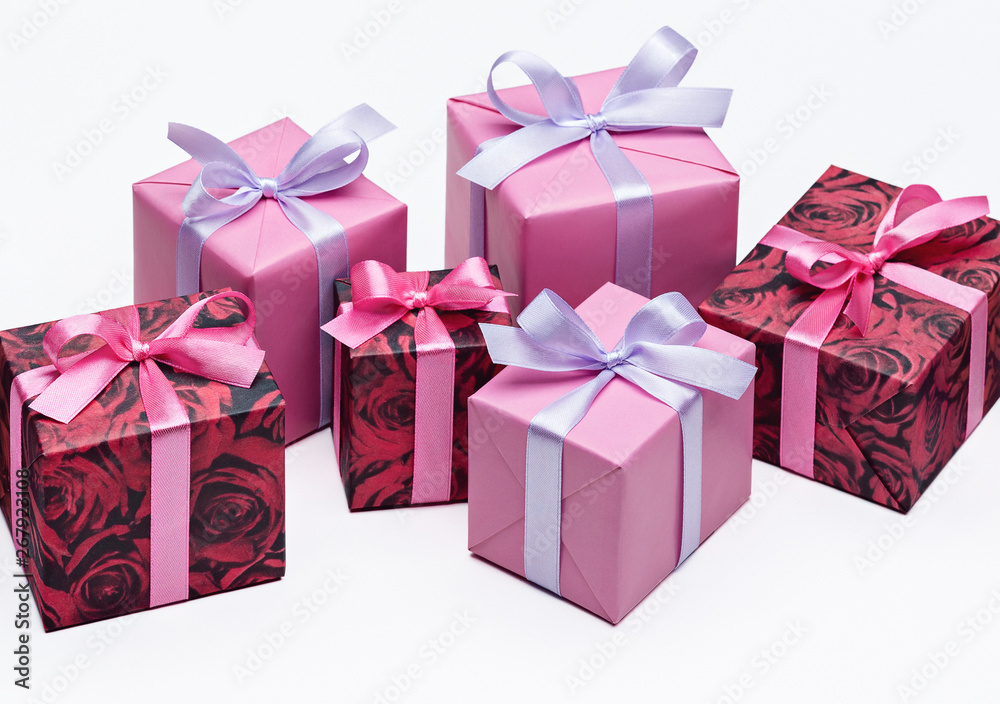 Set of bright colorful gift boxes with ribbons on white background. Copy space for text. Set of bright colorful gift boxes with ribbons on white background. Copy space for text.