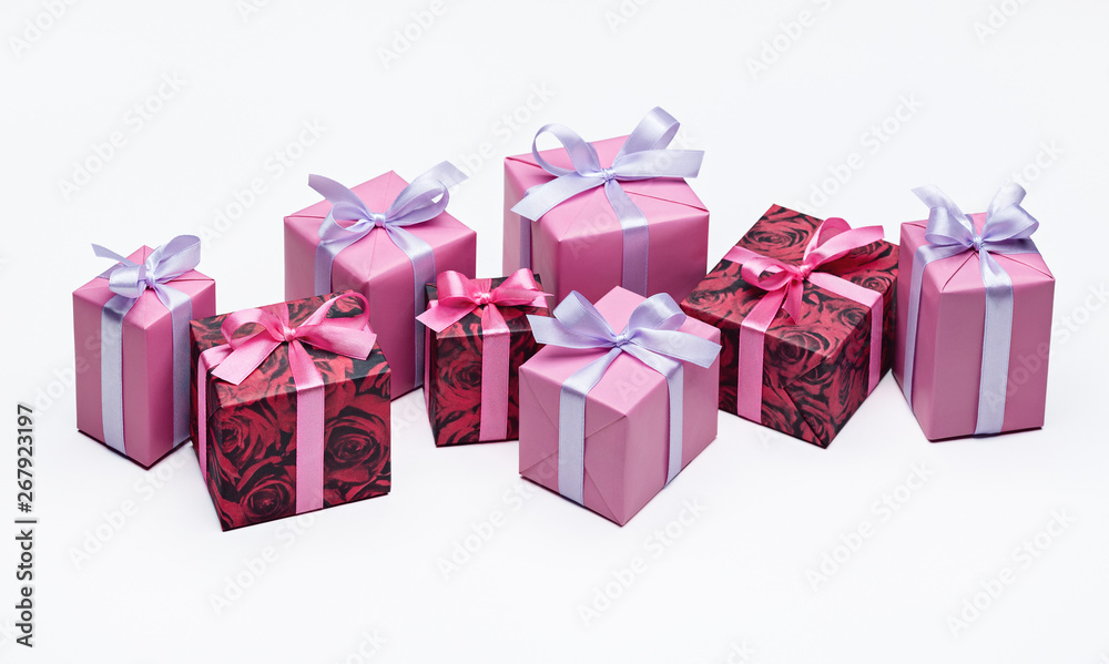 Set of bright colorful gift boxes with ribbons on white background. Copy space for text. Set of bright colorful gift boxes with ribbons on white background. Copy space for text.