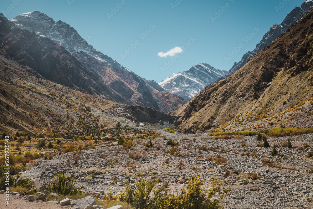 Nature landscape view of wilderness area surrounded by snow capped mountains in Karakoram range, Skardu. Gilgit Baltistan, Pakistan.