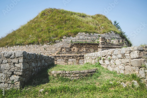 Ruin and ancient historical Buddhist Dharmarajika Stupa. UNESCO World Heritage Site in Taxila. Punjab, Pakistan.  photo