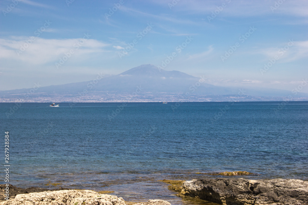 Brucoli beautiful panorama of the sea from the coast, blue sea and sky, Etna in background