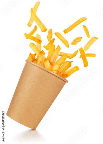 Canvas Print fries spilling out of a take-out paper cup tilted on white background