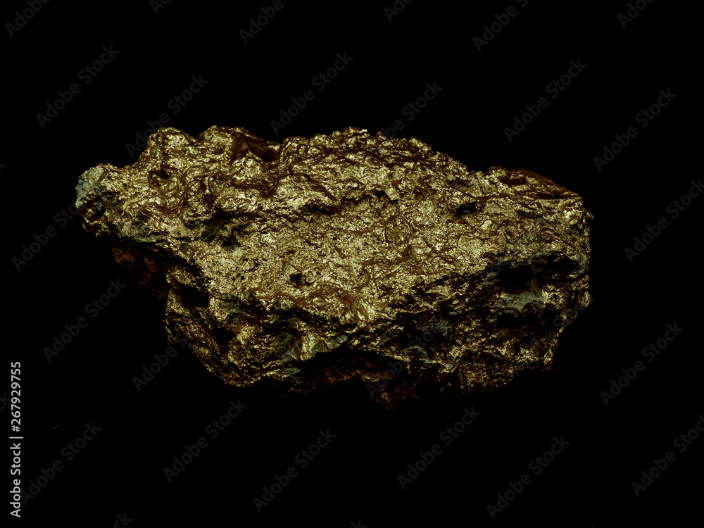macro Gold ore in the boulder , precious stone on black background macro Gold ore in the boulder , precious stone on black background
