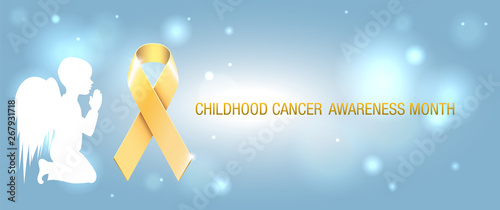 Golden childhood awareness ribbon symbol shining over steel blue background with magic lights and a profile of a praying  kneeling angel child. Concept background for web or print. (ID: 267931718)