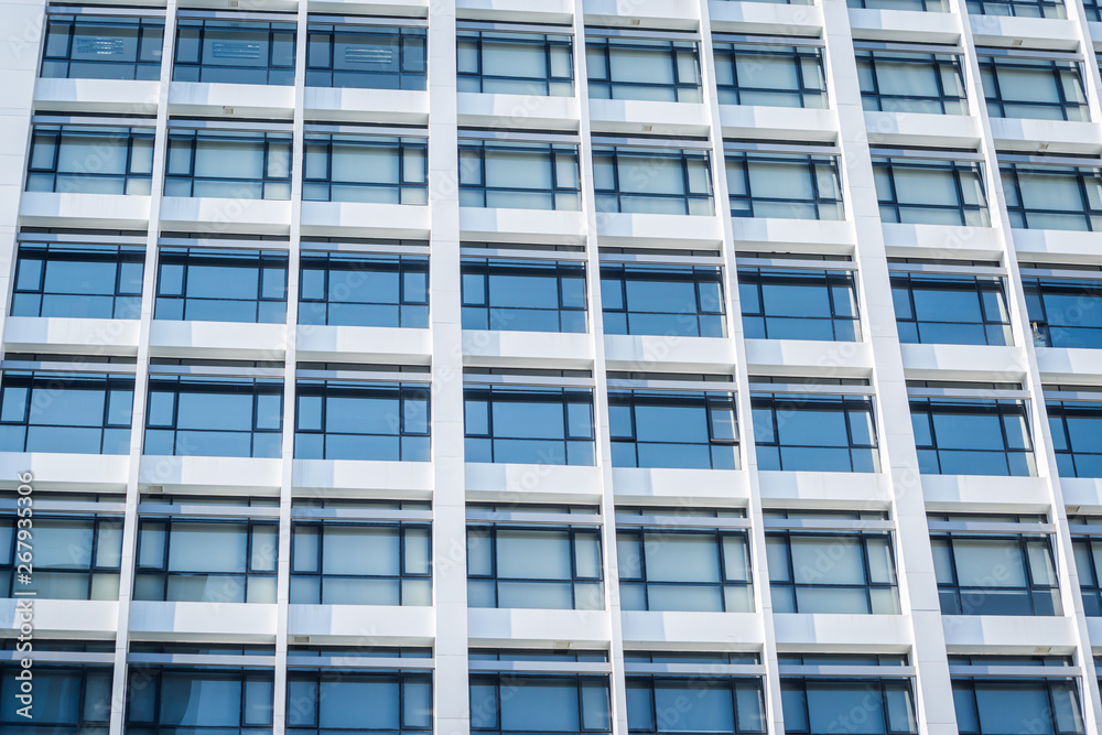 Windows of white building Windows of white building