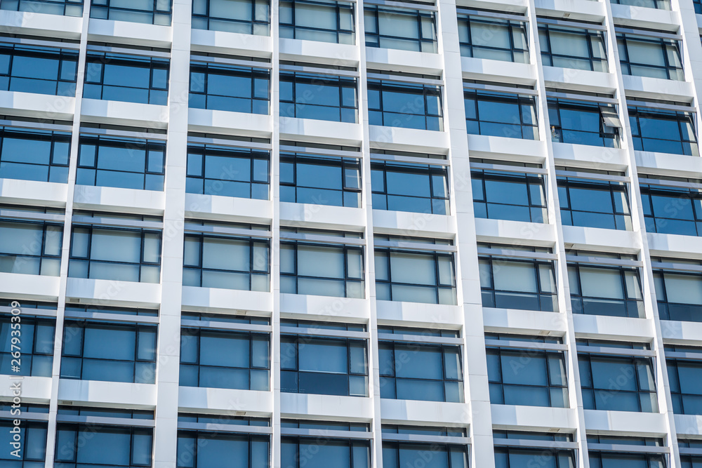 Windows of white building Windows of white building