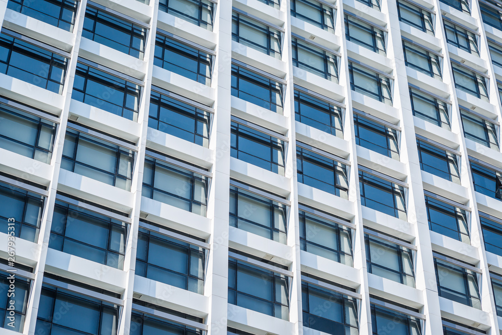 Windows of white building Windows of white building