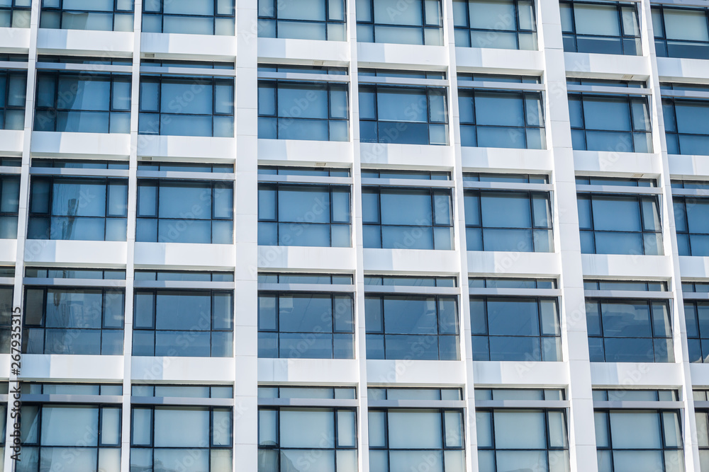 Windows of white building Windows of white building