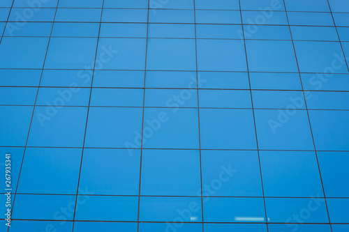 Modern office building with blue glass windows