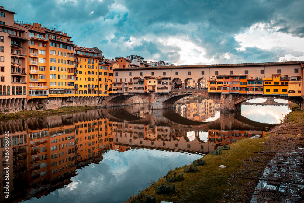 Ponte Vecchio reflected on the arno river