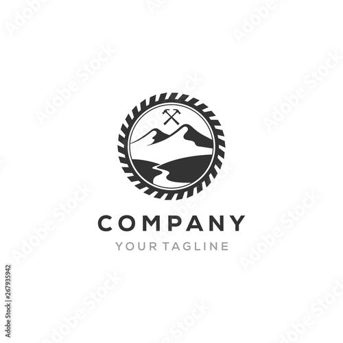 gear for construction logo with the hammer and mountain view in the middle