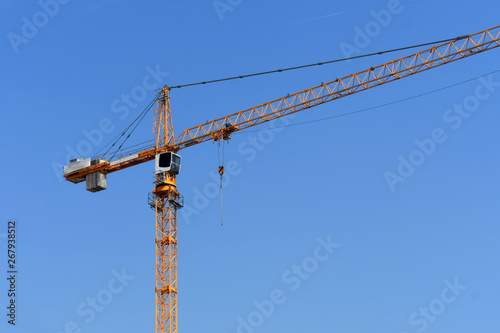 construction crane against the sky fragment