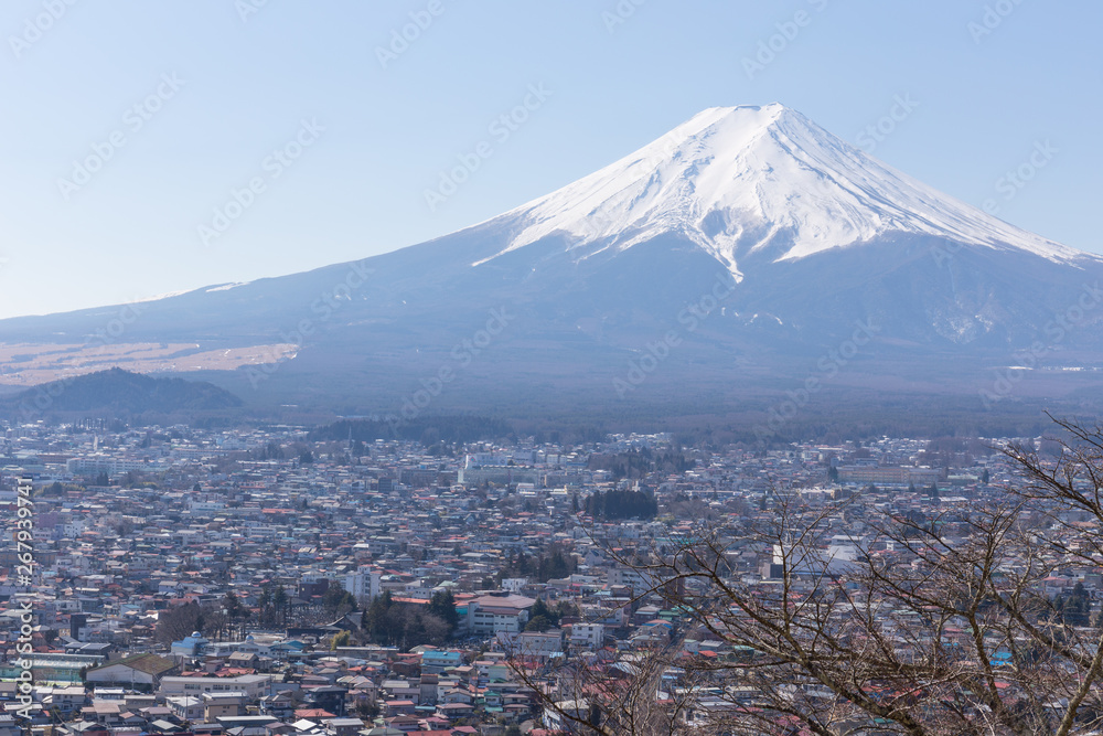Naklejka premium Fuji mountain and Fujiyoshida city in winter