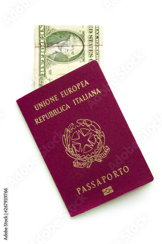 An Italian red passport with a one dollar bill inside on white background