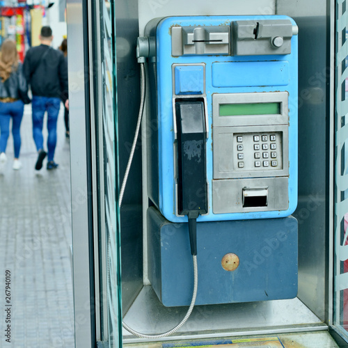 payphone on city street, telephone connection