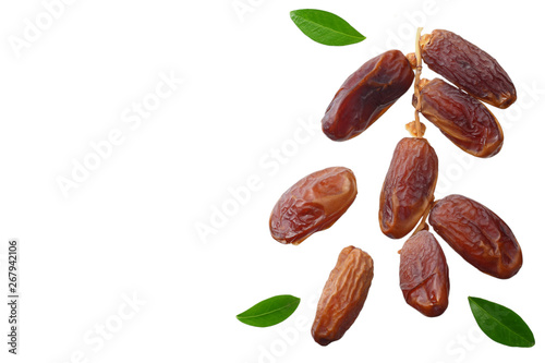 branch with date fruits with green leaves isolated on white background. top view