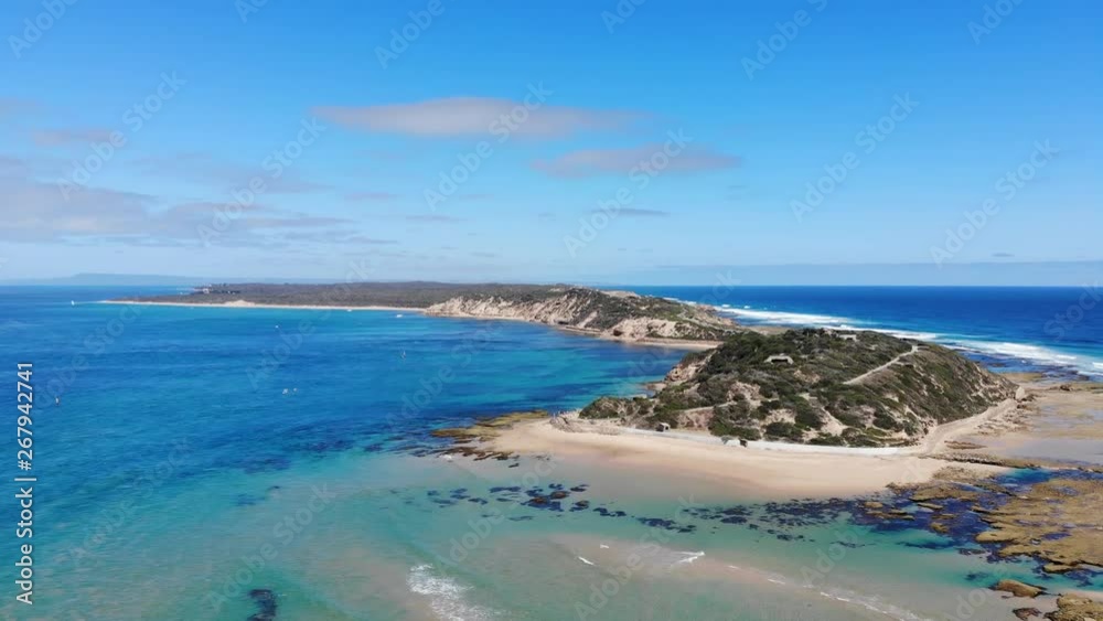 Amazing aerial views of the Napean Peninsula with waves crashing against the beautiful beach. Amazing aerial views of the Napean Peninsula with waves crashing against the beautiful beach.