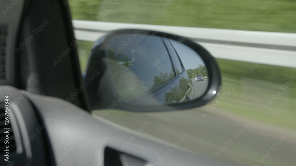 Following Spy Car in Back Mirror