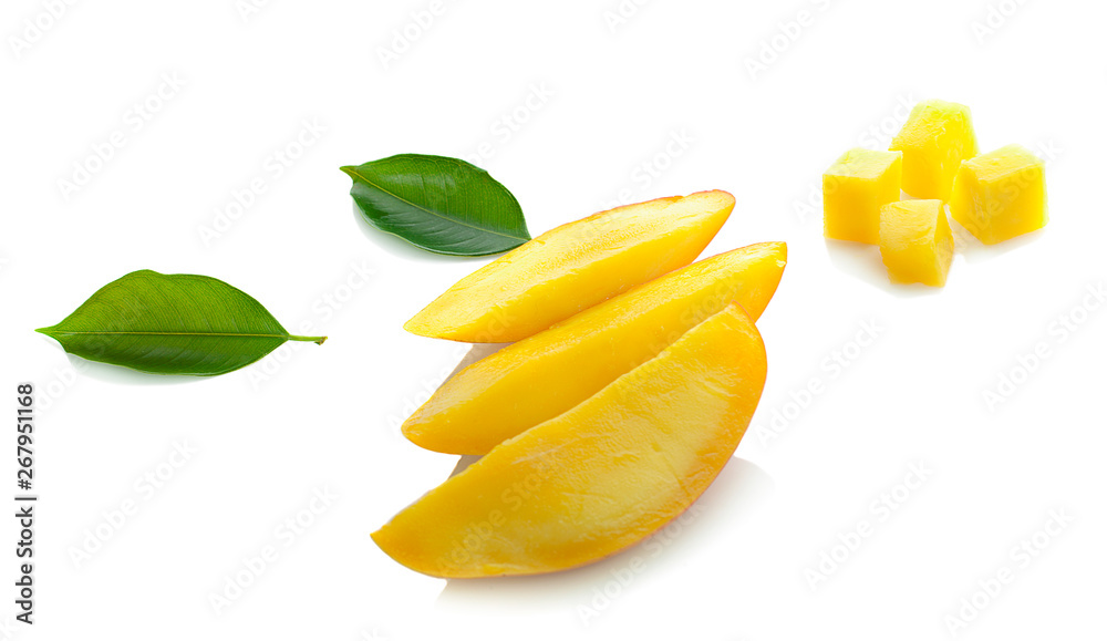 Mango fruit slices and mango leaves over white. File contains clipping paths Mango fruit slices and mango leaves over white. File contains clipping paths