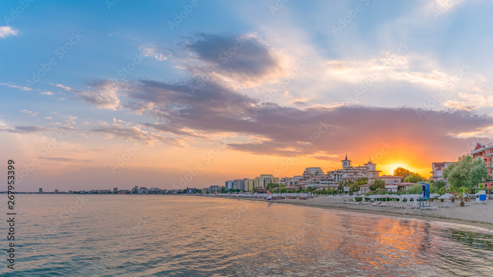 Sunset at the beach in Sunny Beach on the Black Sea coast of Bulgaria. Panoramic view