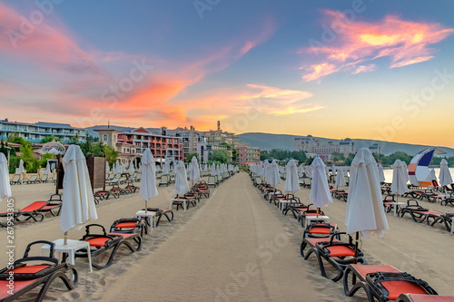 Chairs and umbrellas on a beautiful beach at sunrise in Sunny Beach on the Black Sea coast of Bulgaria