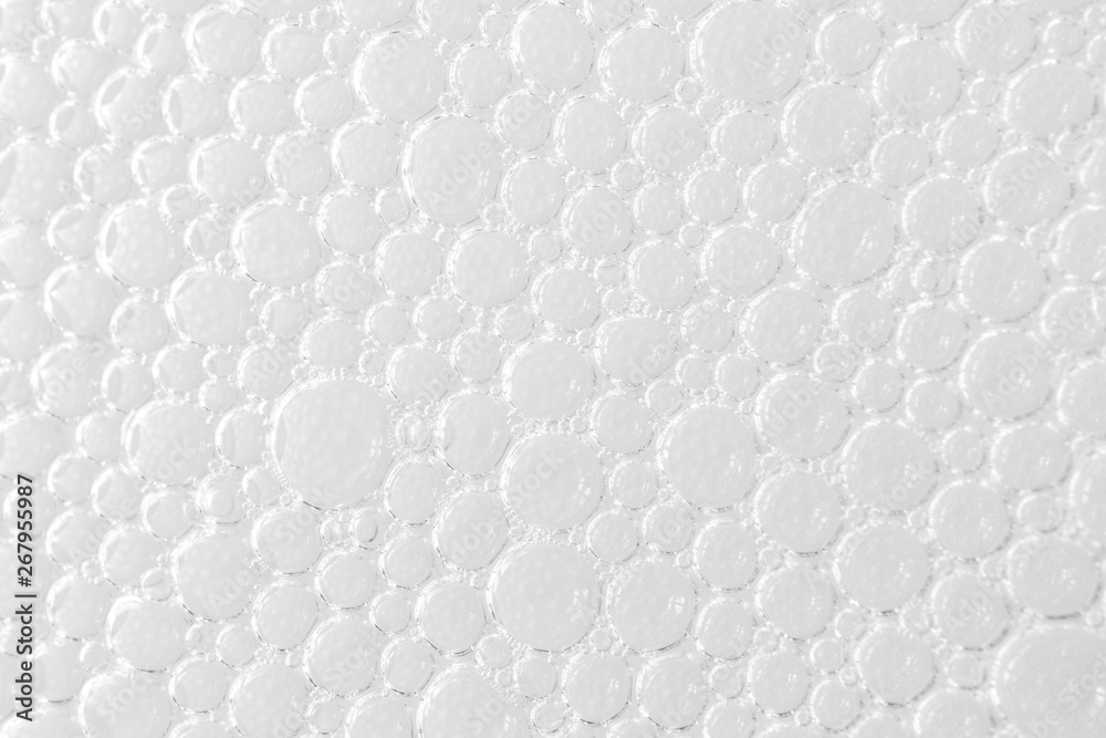 Naklejka premium Macro soap bubbles on white background