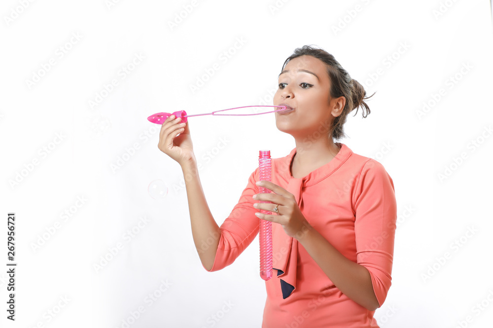 young indian girl Standing isolated over white background