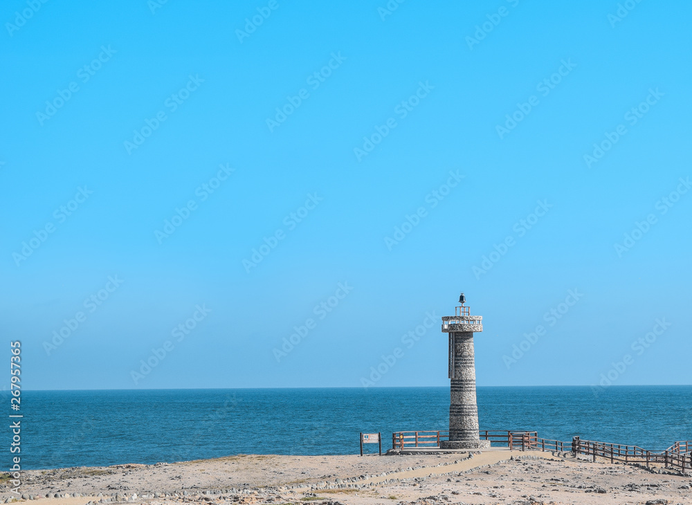 Lighthouse on the coast of sea