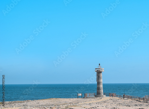 Lighthouse on the coast of sea