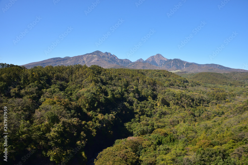 Mountains with red leaves and blue sky Mountains with red leaves and blue sky