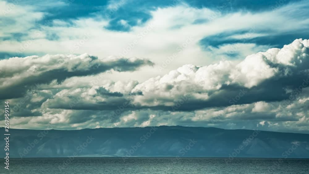 Fast moving dramatic clouds over the lake Baikal Cloudscape timelapse