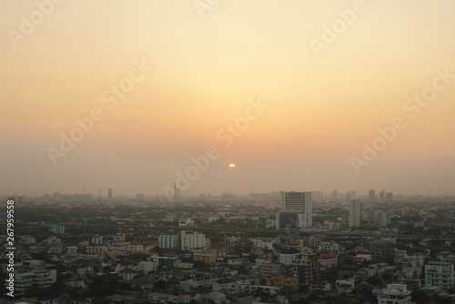 Sunset at Bangkok, capital of Thailand with dust and smoke