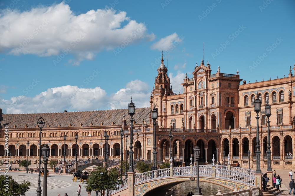 view of Seville's main square Plaza de Espana from arch covered walkway Spain