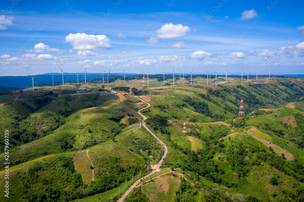 landscape wind turbines on the mountain farmland and blue sky background landscape wind turbines on the mountain farmland and blue sky background