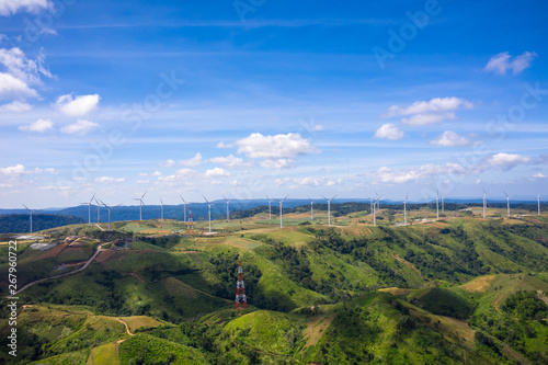 landscape wind turbines on the mountain farmland and blue sky background