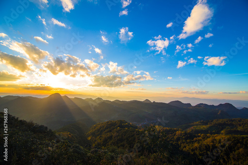 Colorful majestic sunset sky with cloud on peak of mountain © themorningglory