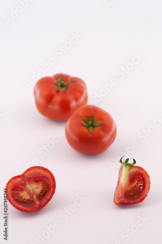 Red Tomatoes and slices © Toni