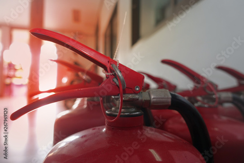 Latch and pin of Red  Chemical fire extingusher  .