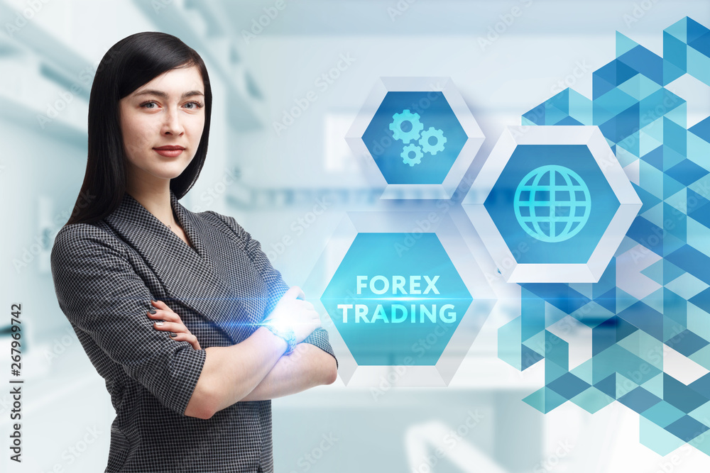 The concept of business, technology, the Internet and the network. A young entrepreneur working on a virtual screen of the future and sees the inscription: Forex trading The concept of business, technology, the Internet and the network. A young entrepreneur working on a virtual screen of the future and sees the inscription: Forex trading