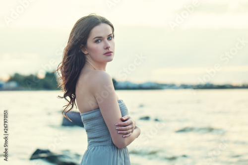 Beautiful brunette woman face outdoors © millaf