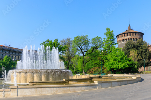 Beautiful fountain and round tower of Castello Sforzesco