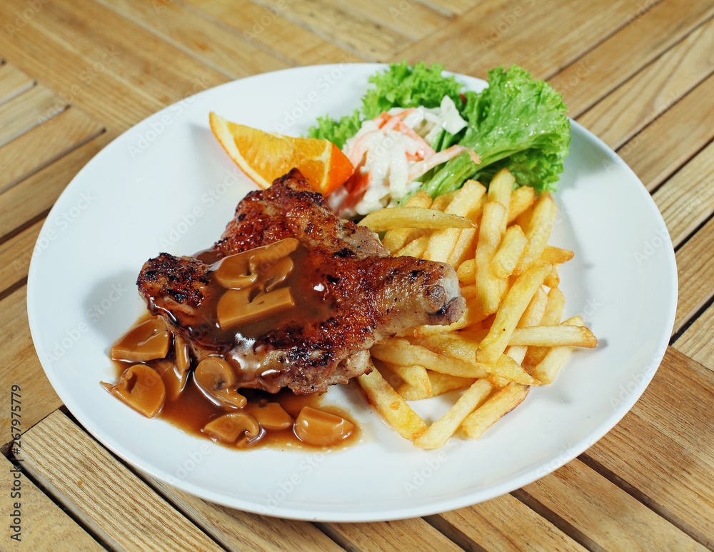 Western food , chicken grill on a white plate ready to be serve. Western food , chicken grill on a white plate ready to be serve.