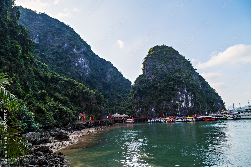 Rocky landscape Vietnam, Ha Long Bay Cruse liner junk sails in sea landscape travel