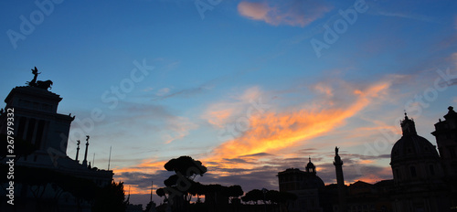 Beautiful sunset over Rome historical center monuments in the central Piazza Venezia (Venice Square) © crisfotolux